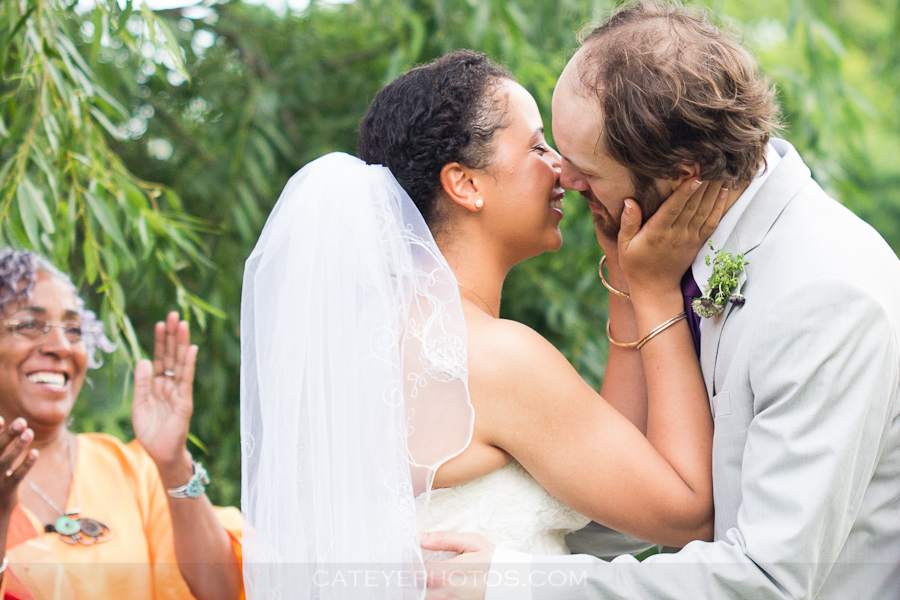 brooklyn wedding photographer, new york wedding,wedding kiss, bride and groom,officiant,garden